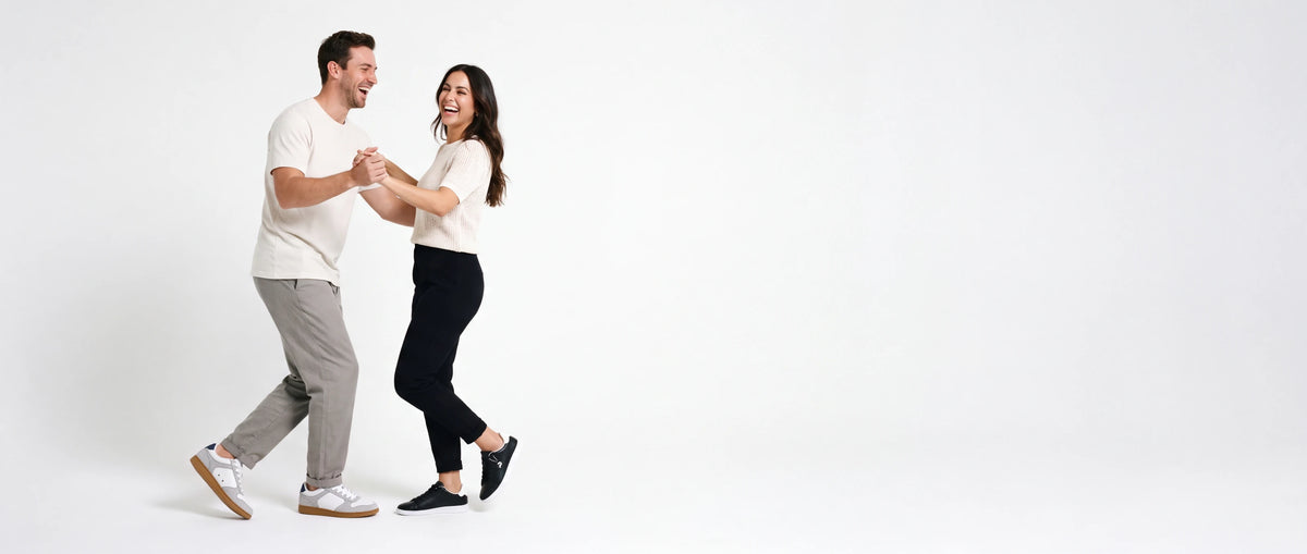 Two dancers wearing Flow 2 Axe and Nova Fox dance sneakers while dancing salsa